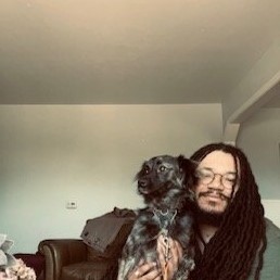 Man with dog in living room